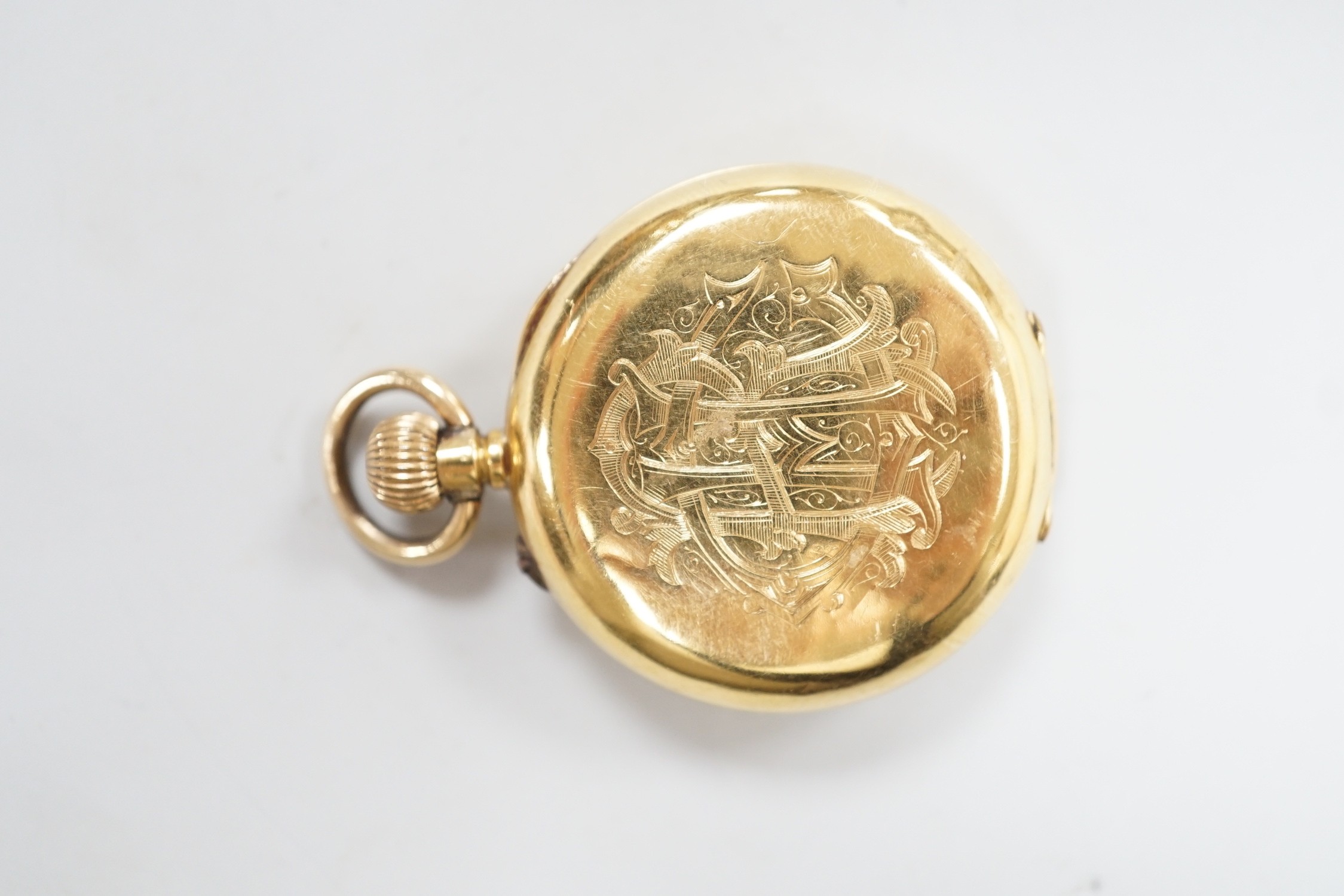 An 18k yellow metal and guilloche enamelled half hunter fob watch, with Roman dial, case diameter 34mm, gross weight 33.7 grams, the case back with engraved monogram.